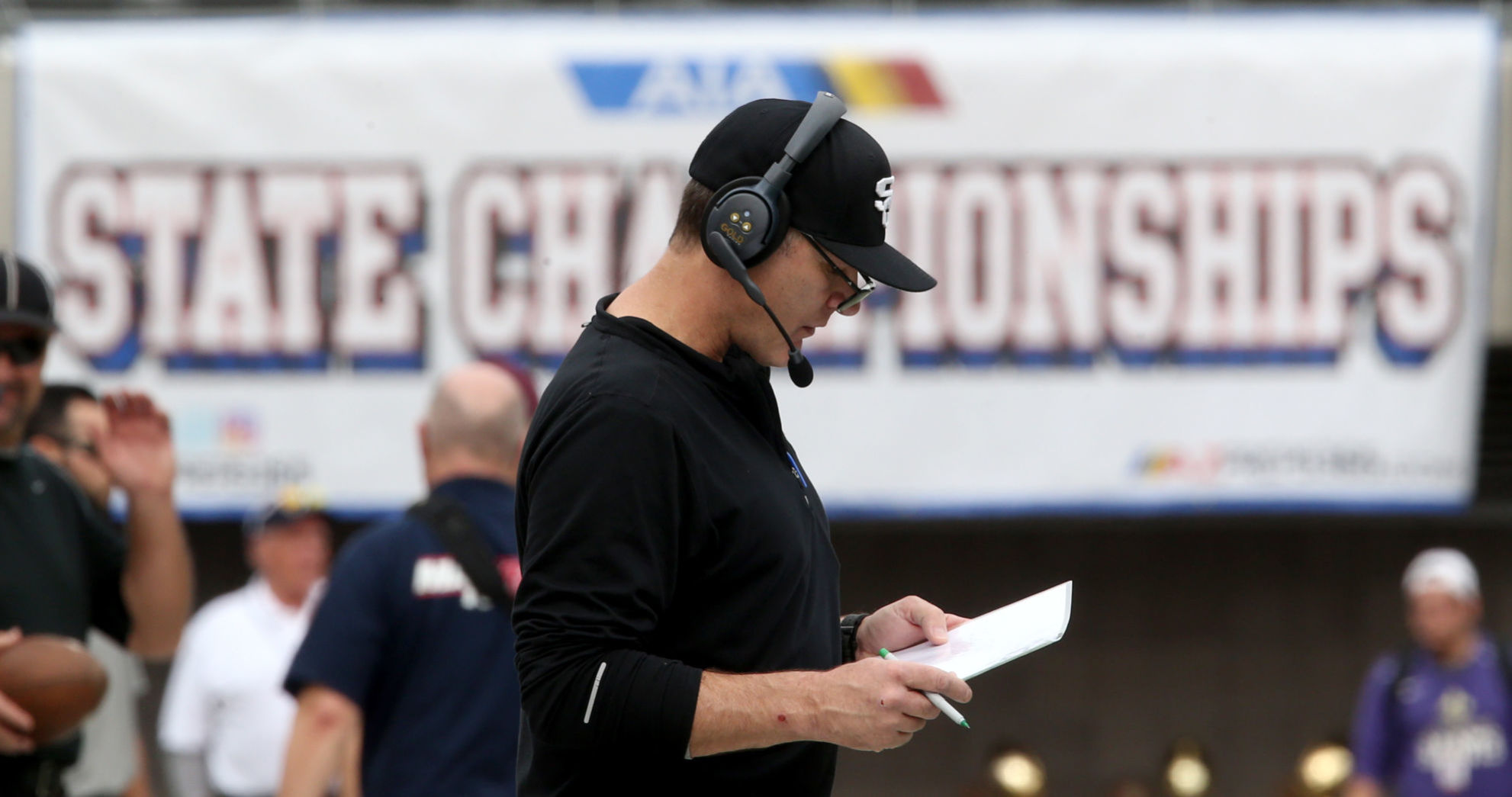 Sapolinte HS football coach Dennis Bene